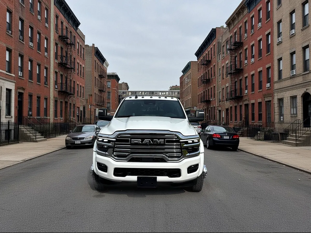 Bronx Towing Express tow truck parked on a Bronx residential block, front view